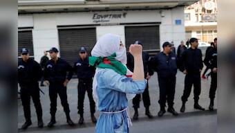 Algerians celebrate as Bouteflika abandons plan to seek new term