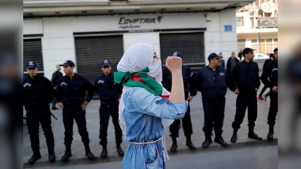 Algerians celebrate as Bouteflika abandons plan to seek new term