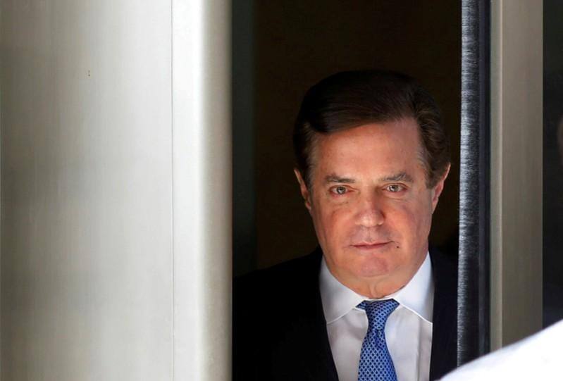 Trump ex-aide Manafort hit with 3-1/2 more years in prison, new charges