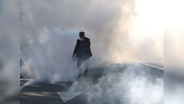 Albanian police disperse protesters with tear gas and water cannon