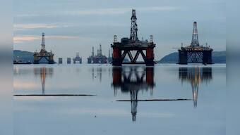 Oil close to four-month highs on OPEC-led output cuts, U.S. stock draw