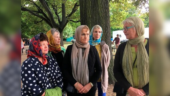 New Zealand women don headscarves to support Muslims after shootings