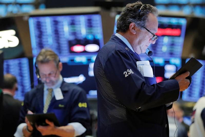 Wall Street bogged down by growth worries falling yields