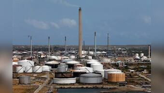 Exclusive: U.S. orders foreign firms to further cut down on oil trades with Venezuela