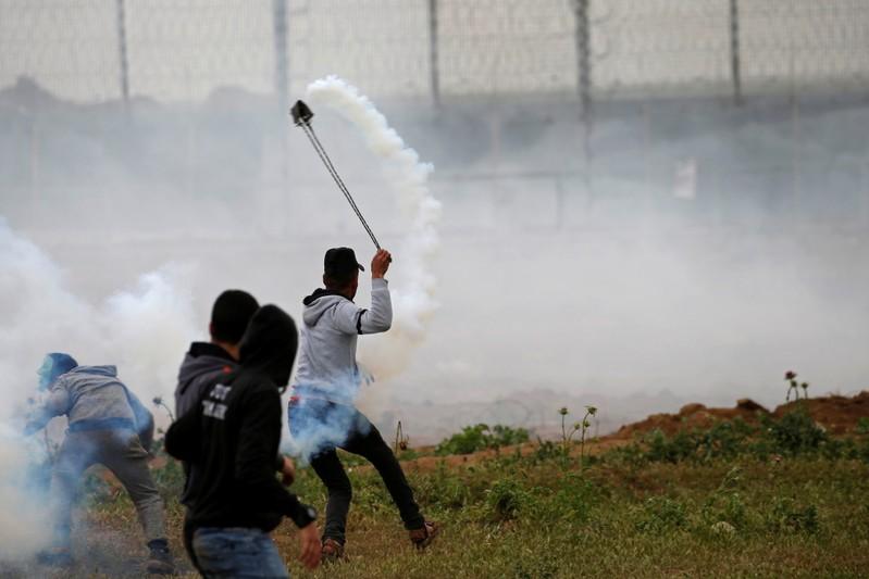 Palestinians mass at Gaza border to mark protest anniversary Palestinians mass at Gaza border to mark protest anniversary