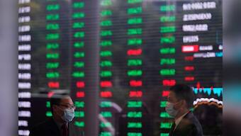 Asian shares poised to slide as surprise Fed cut fails to halt rout