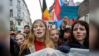 Climate change or coronavirus? 'Pick your evil', protesters say