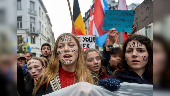 Climate change or coronavirus? 'Pick your evil', protesters say