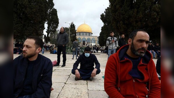 Muslims pray in thousands, heed coronavirus warnings at Jerusalem holy site