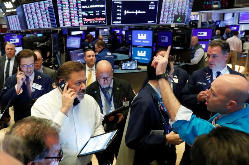 Wall Street ekes out gains as Fed steps in