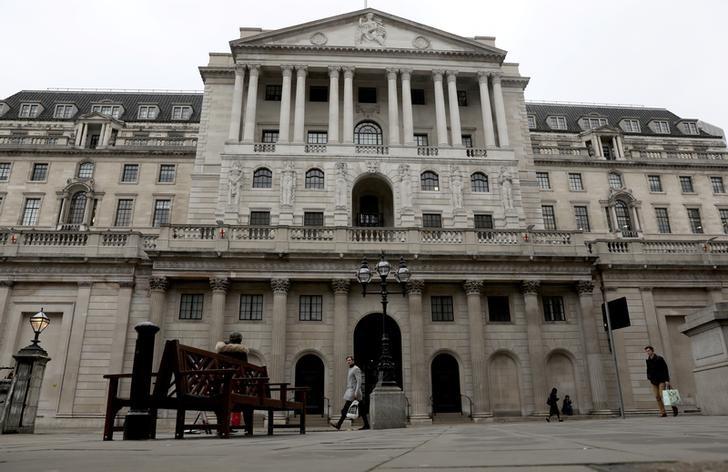 Bank of England cuts rates to 01 ramps up bondbuying