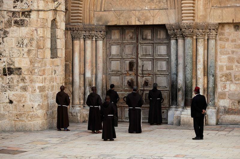 Praying outside Church of the Holy Sepulchre but unable to enter