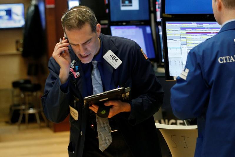 Wall St gains on strong earnings, tech resurgence