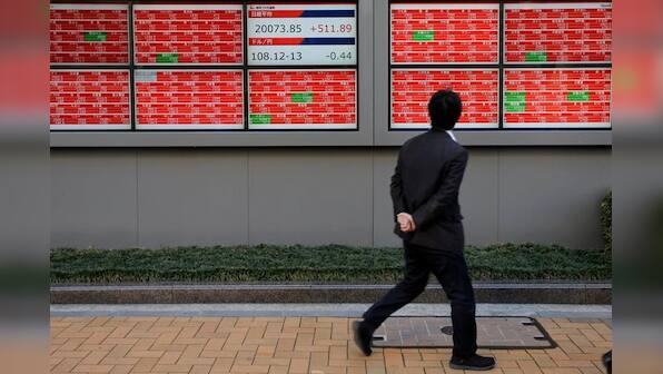 Global Markets: Asian shares pause near eight-month high, dollar weakens