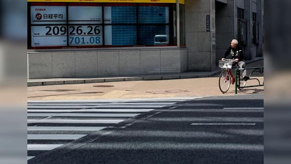 Asia stocks hover below nine-month peak after Wall Street stalls