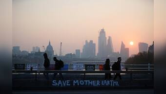 Climate-change protesters disrupt London docklands train service