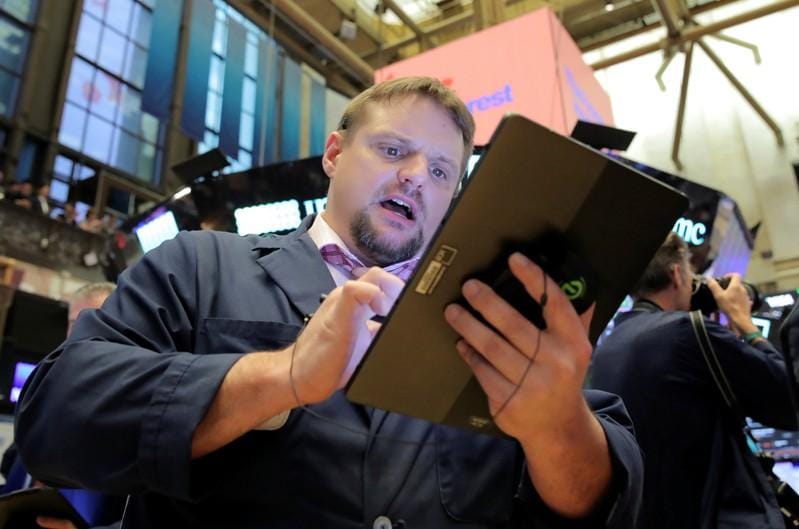 Wall Street pauses as investors await spate of major earnings