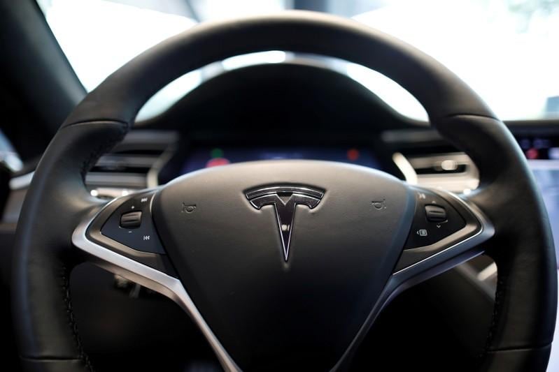 Factbox: Elon Musk on Tesla's self-driving capabilities