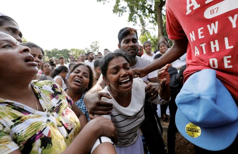 We are shell shocked Relatives bury dead in Sri Lanka amid new security fears