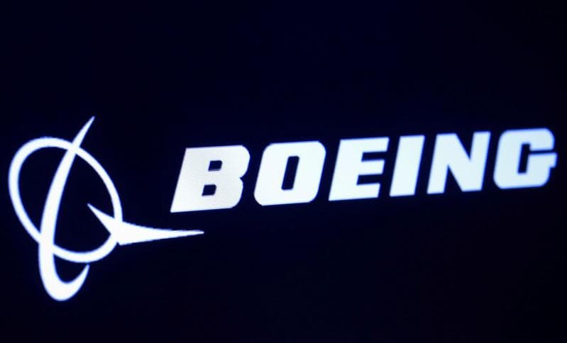 Boeing abandons outlook takes 1 billion cost hit in MAX crisis