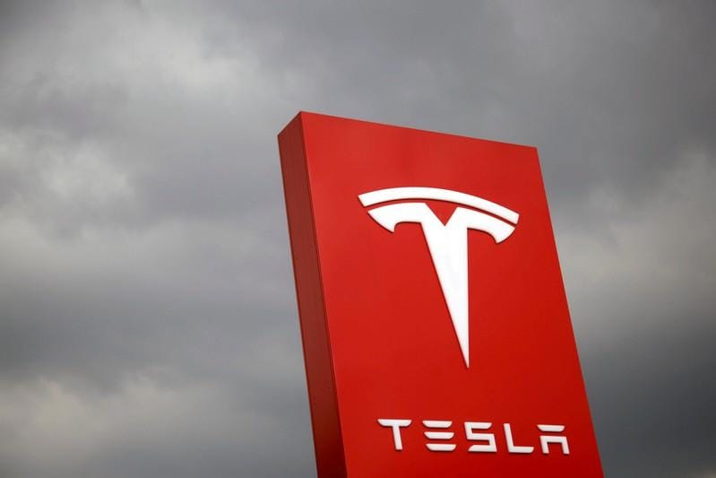 Tesla reports first-quarter losses, more to come
