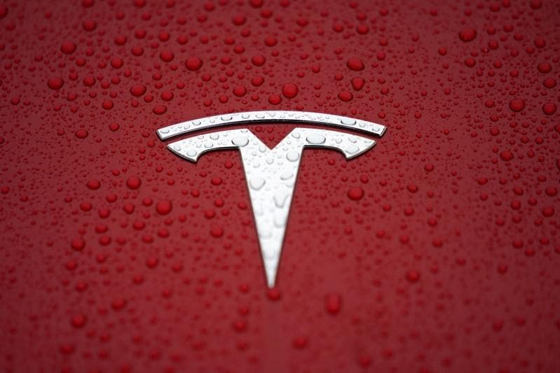 Ending tough week Tesla shares sink to lowest level in two years