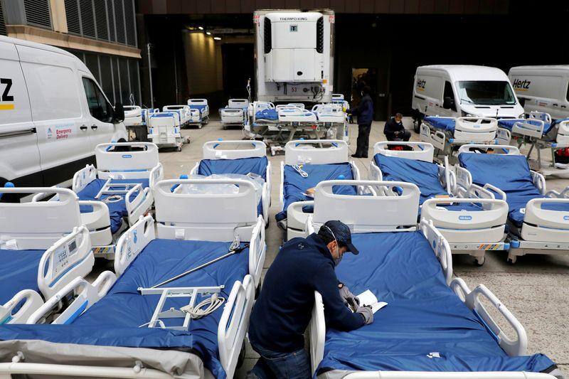 U.S. rushes to build makeshift hospitals as death toll rises over 800