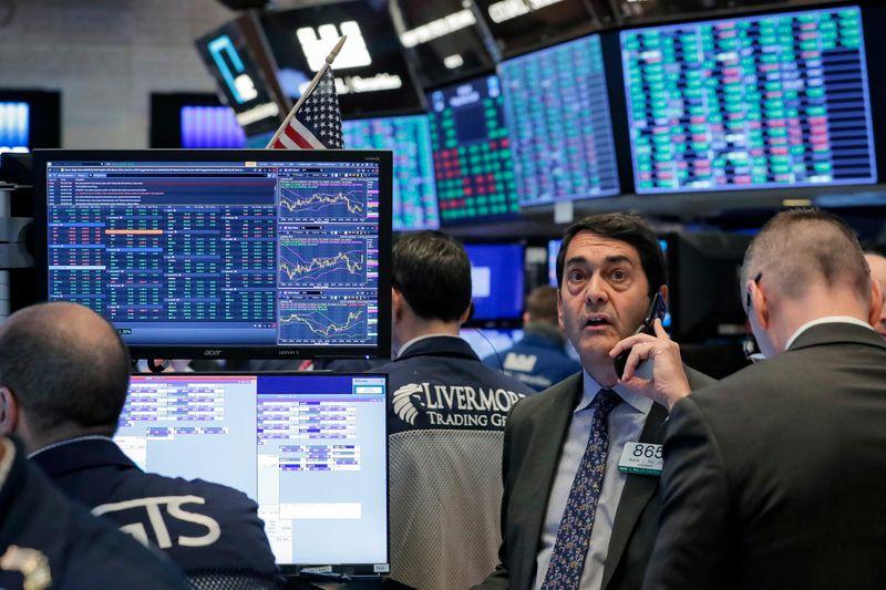 Wall Street rises on Feds 23 trillion rescue plan