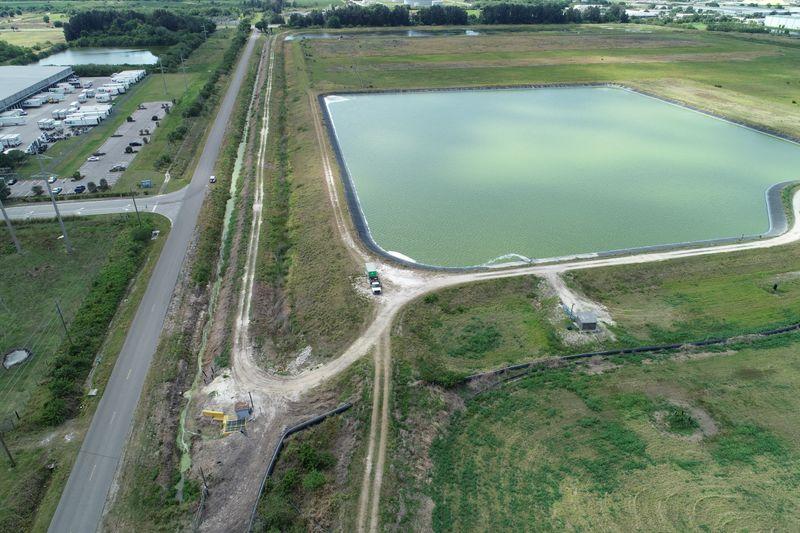Crews scramble to drain waste water reservoir on brink of collapse in Tampa Bay