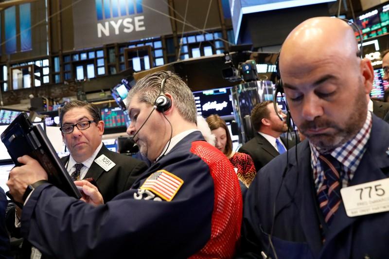 Wall St slides as healthcare drags, oil prices weigh