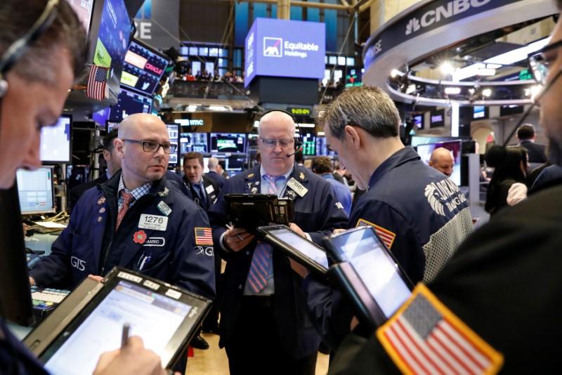 Dollar eases, stocks climb amid benign U.S.inflation