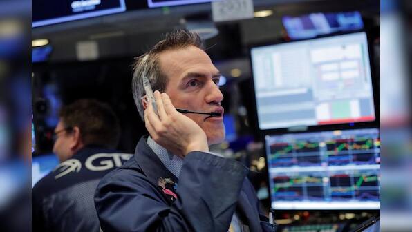 World stocks rise amid U.S.-China trade hopes; dollar slips