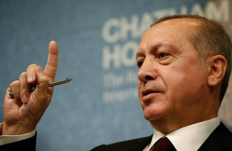 UK PM May warns Turkey’s Erdogan not to lose sight of democratic values