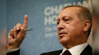 UK PM May warns Turkey's Erdogan not to lose sight of democratic values
