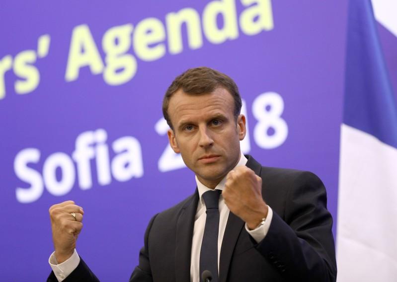 Macron rules out trade war over Iran deal as firms head for exit