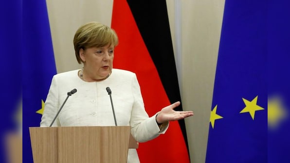Putin seeks common cause with Merkel over Trump