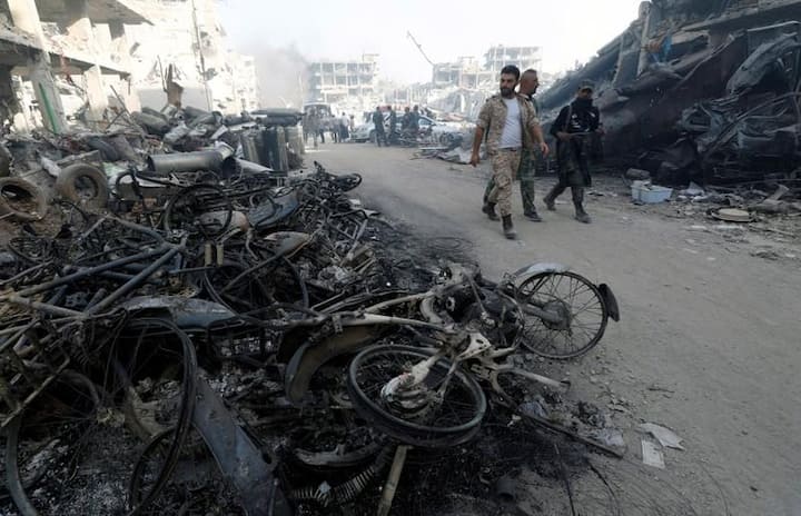 Syria's army captures last insurgent area near Damascus