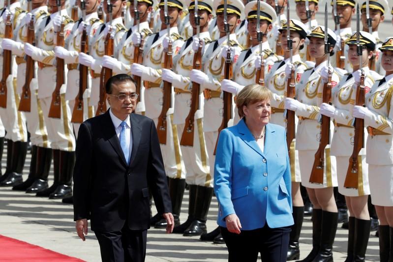 Merkel woos China as Trump poses new trade challenge