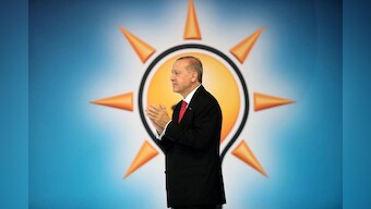 As lira tumbled, Turkey's prime minister won Erdogan over for rate hike
