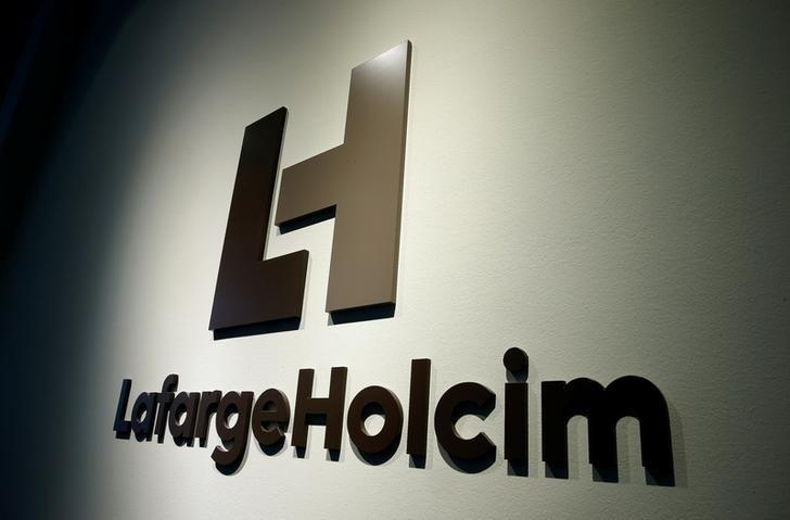 LafargeHolcim to close Paris Zurich head offices axing 200 jobs