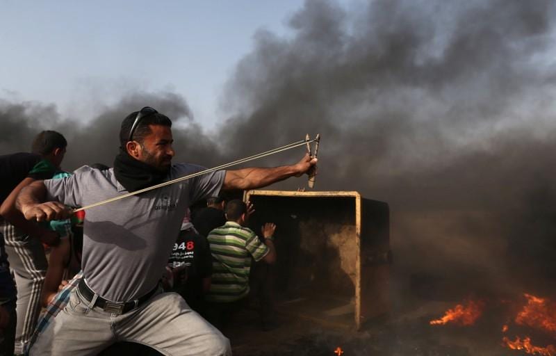Dozens of Palestinians injured by Israeli gunfire tear gas in Gaza border protests