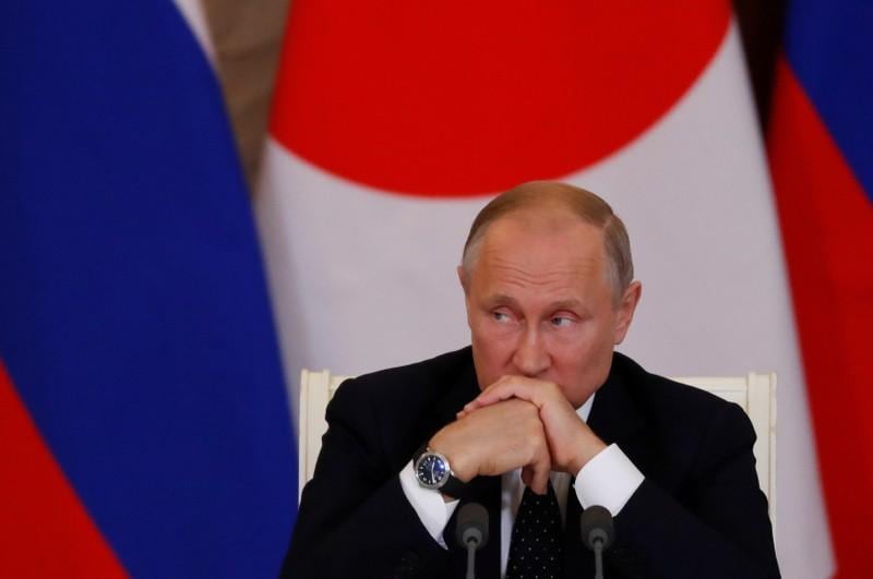 Putin after meeting Japans Abe calls for restraint on North Korea