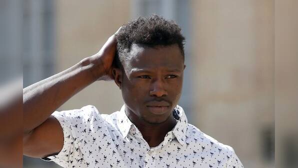 France offers citizenship to Malian immigrant who scaled building to save child