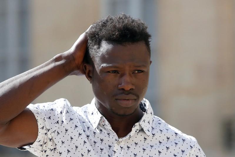 France offers citizenship to Malian immigrant who scaled building to save child France offers citizenship to Malian immigrant who scaled building to save child