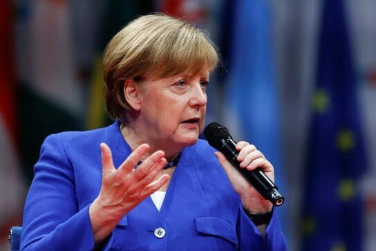 Merkel says political hate speech is 'playing with fire' Merkel says political hate speech is 'playing with fire'