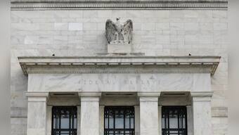 Fed officials see risks in weaker inflation expectations, trade row