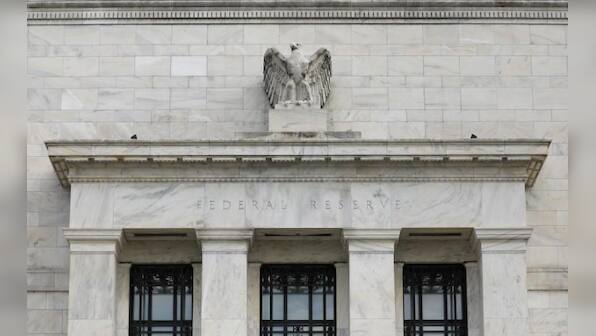 Fed officials see risks in weaker inflation expectations, trade row