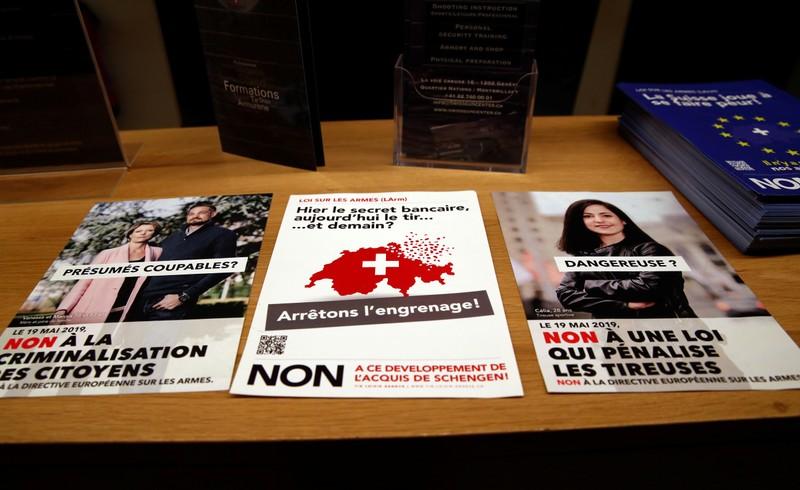 Swiss voters approve tighter gun control avoid EU clash