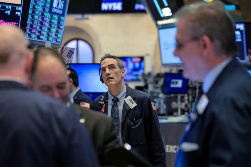 Wall St slides as Huawei fallout hits tech shares