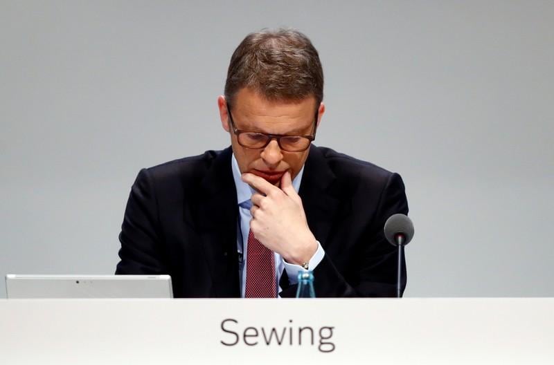 Deutsche Bank CEO pledges tough investment bank cuts as shares hit low
